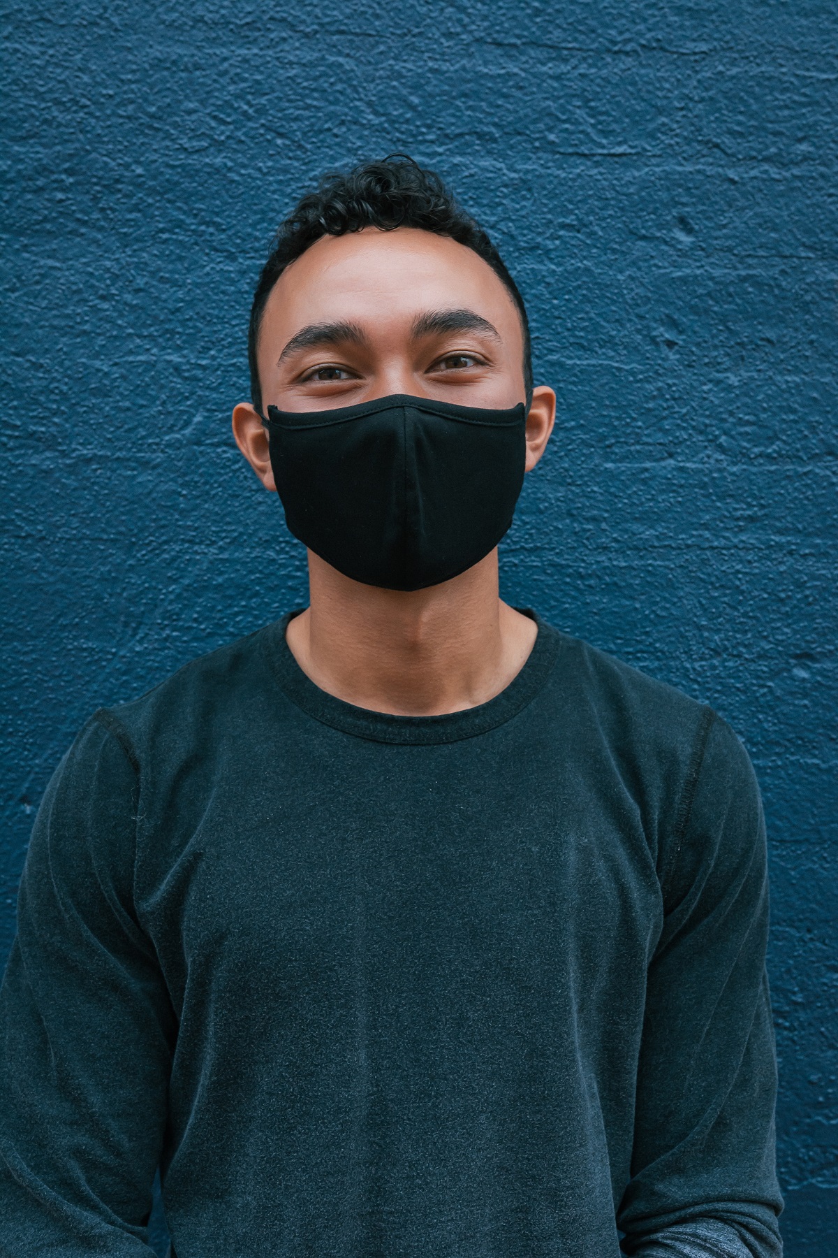 man wearing black face mask